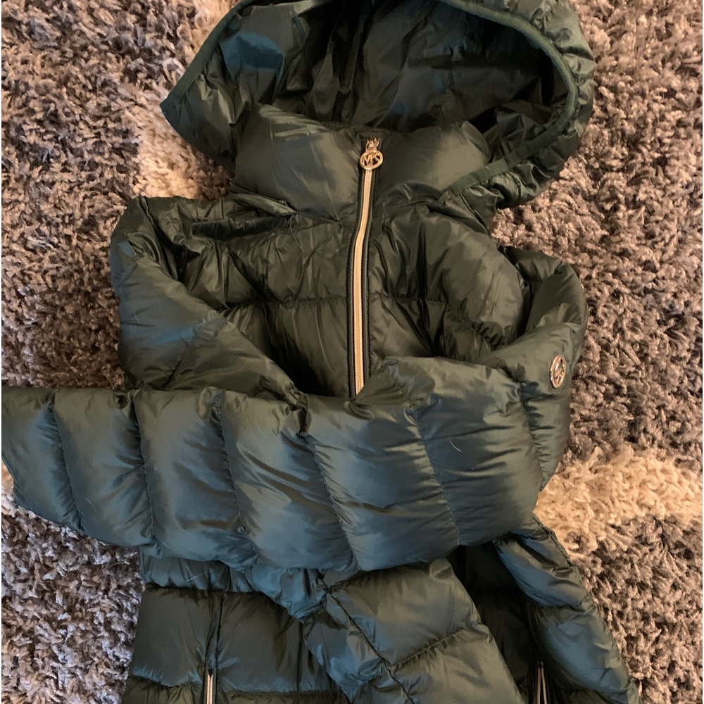 New without tags Michael Kors winter coat. Silver accent. 3/4 length